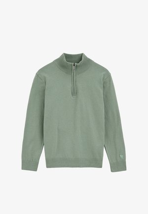 Groene gebreide trui met een hoge kraag, een ritssluiting tot een kwart en geribbelde manchetten. Heeft een logo-accent op de onderkant van de linker mouw.