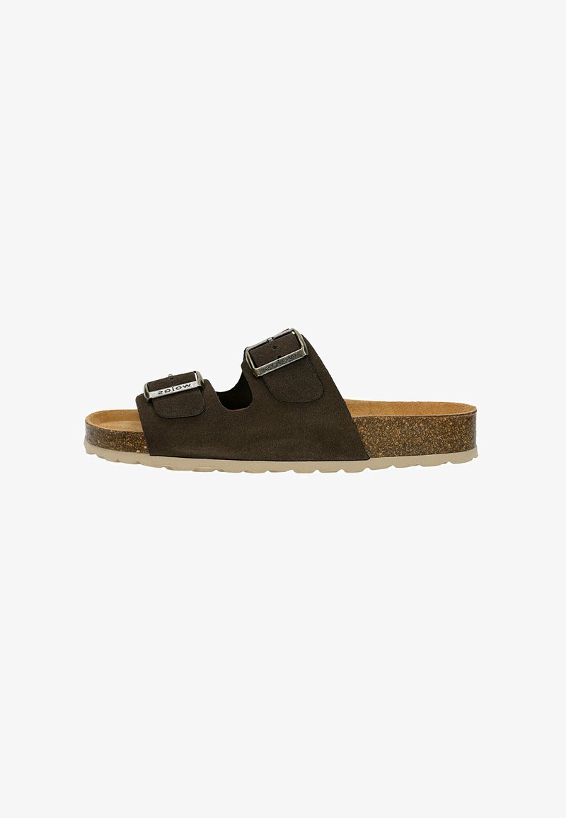 Sandale mule en daim marron avec deux boucles ajustables et semelle en liège sur une semelle beige clair.
