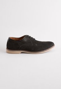 Dark gray suede lace-up shoes with a smooth texture, beige rubber sole, and contrasting stitching details. Rounded toe and minimal design.