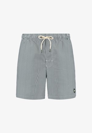 Dryžuoti maudymosi šortai tamsiai mėlynos ir baltos spalvų, su elastingu juosmeniu, raiščiu, šoninėmis kišenėmis ir mažu logotipo ženkleliu ant apvado.