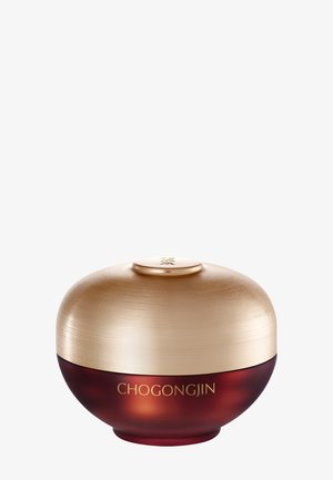 Rundes Kosmetikglas mit dunkelrotem Boden und goldfarbenem Deckel, vorne in goldenen Buchstaben mit "CHOGONGJIN" beschriftet.