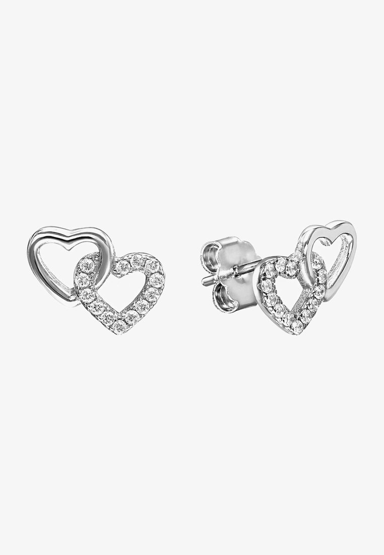 Silver heart-shaped stud earrings featuring one heart outlined in a smooth finish and another adorned with clear, sparkling gemstones.