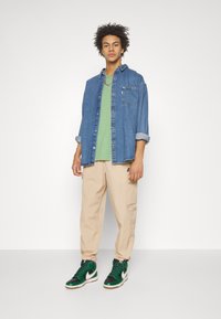 Nike Sportswear Pantaloni cargo - hemp/black