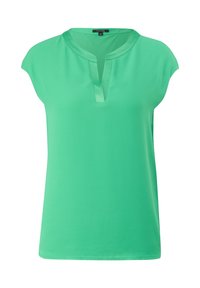 Blouse verte à manches courtes avec un col rond et une fente devant, présentée sur fond blanc.