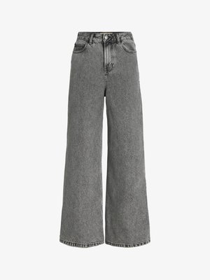 Jeans de pierna ancha hechos de denim gris, con una cintura alta, bolsillos estándar y un sutil patrón desteñido. Dobladillo con corte sin rematar en la parte inferior.