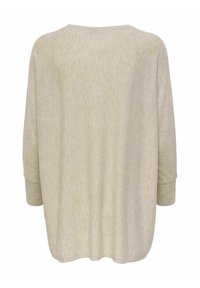 Pull en maille beige ample à manches longues et poignets côtelés, vu de dos.