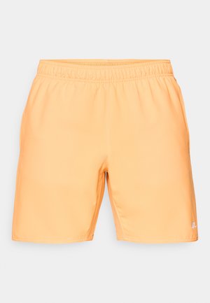 Trumpai pagaminti iš lengvo, glotnaus audinio šviesiai oranžinės spalvos, su elastine juostos juosmenyje ir šoninėmis kišenėmis; apatiniame dešiniajame kampe yra nedidelis logotipas.