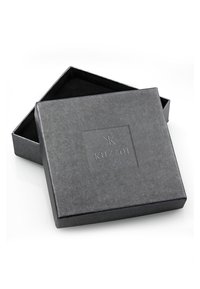 Black gift box with a textured surface, featuring an embossed logo. The lid is slightly open, revealing a soft black interior.