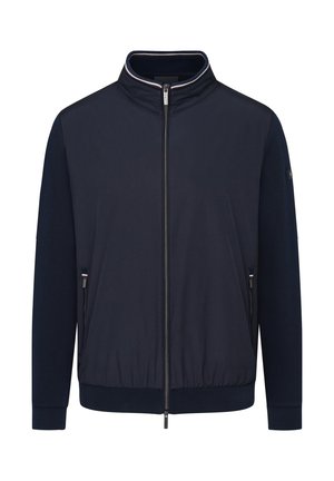 Giacca a zip blu navy con colletto alto, pannelli a maglia e lisci, due tasche laterali e striscia sul colletto a contrasto.
