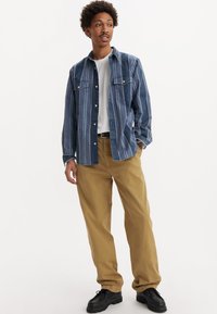 Levi's® - Chinosy
