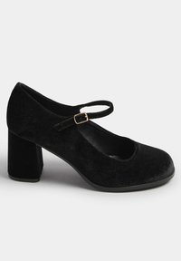 Scarpa Mary Jane in velluto nero con punta tonda, cinturino alla caviglia con fibbia dorata e tacco largo. Texture liscia e finitura morbida.