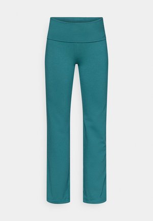 Pantalon de yoga turquoise avec une large ceinture lisse. Confectionné en tissu extensible, avec une jambe ajustée et un design épuré et simple.