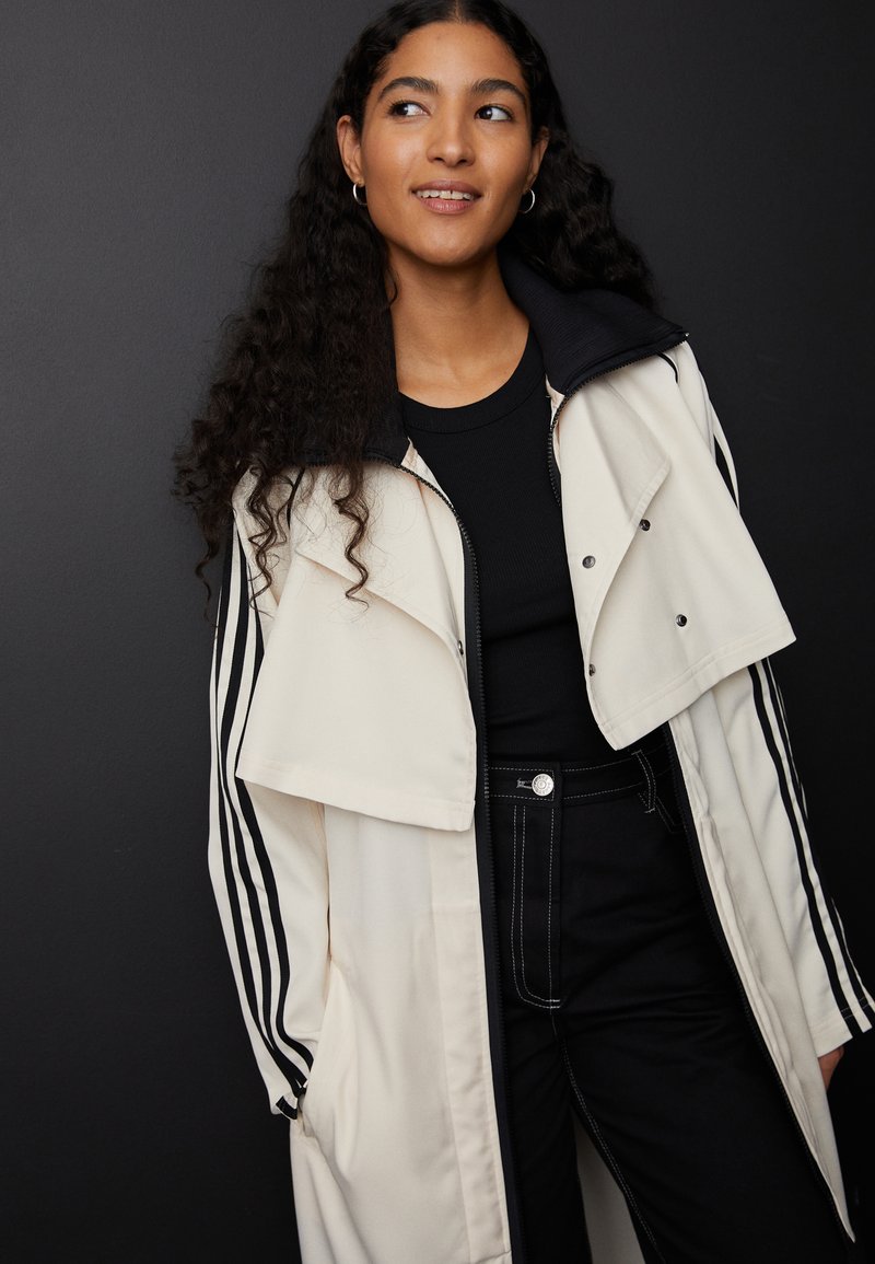 adidas Originals ALWAYS Trenchcoat white Zalando.co.uk