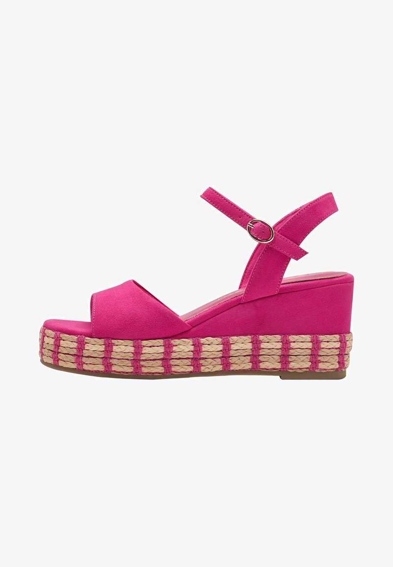 Pink suede wedge sandals with a platform made of woven jute. Features an adjustable ankle strap and open toe design.