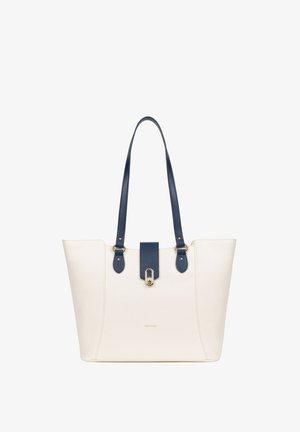 Cremefarbene Kunstleder-Tasche mit dunkelblauen Akzenten und Trägern, ausgestattet mit einem goldenen Verschluss und minimalistischer Gestaltung. Ideal für den Alltag.