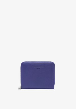 Compact purple leather zip-around wallet with silver zipper and embossed "Liebeskind Berlin" logo on front.