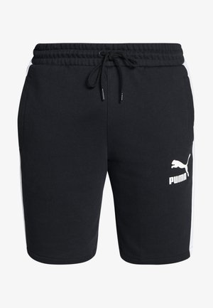 Pantalones cortos negros de Puma con rayas blancas a los lados, cinturilla elástica, cordón ajustable y bolsillos frontales visibles desde la vista frontal.