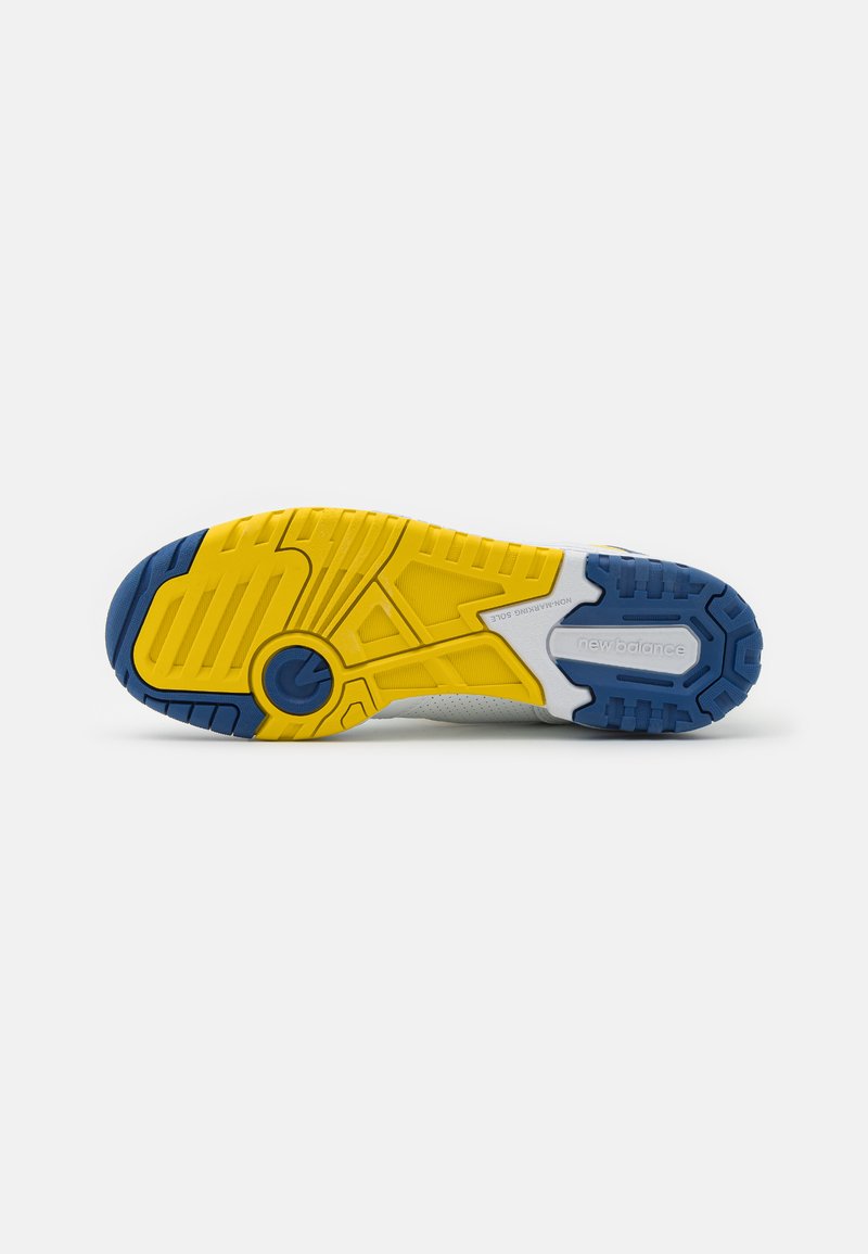Schuhsohle mit einem strukturierten Design in einer überwiegend gelben und blauen Farbgebung. Langlebiges Gummimaterial mit ausgeprägten Rillen.
