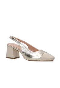 Metallic gold slingback shoe with a squared heel, rounded toe, and contrasting beige cap. Smooth texture with minimal detailing.