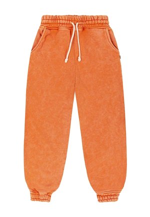 Pomarańczowe spodnie dresowe na sznurku z elastycznym pasem i ściągaczami, bocznymi kieszeniami, wykonane z miękkiego, teksturowanego materiału.
