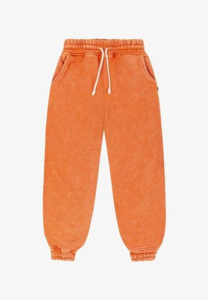 Pomarańczowe spodnie dresowe na sznurku z elastycznym pasem i ściągaczami, bocznymi kieszeniami, wykonane z miękkiego, teksturowanego materiału.