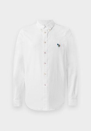 Camisa branca de botões com mangas compridas, apresentando um tecido texturizado discreto e um detalhe bordado de um cavalo multicolorido no lado esquerdo do peito.