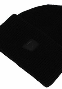 Black knitted beanie hat with ribbed texture, featuring a square black fabric patch accent with minimal design. Soft material, snug fit.