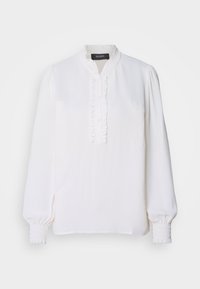 Hvid langærmet bluse med rynket ståkrave, knaplukning og smockede manchetter, lavet af letvægts tekstureret stof.