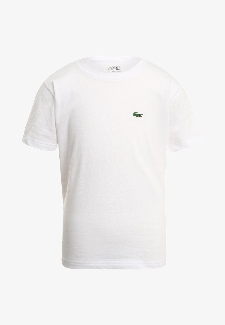 T-shirt blanc à manches courtes et col rond avec un petit logo crocodile vert sur la poitrine gauche et une étiquette de marque visible à l'intérieur du col.