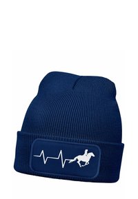 Knitted navy beanie with a ribbed texture, featuring a white graphic of a horse and rider with a heartbeat line on a badge.