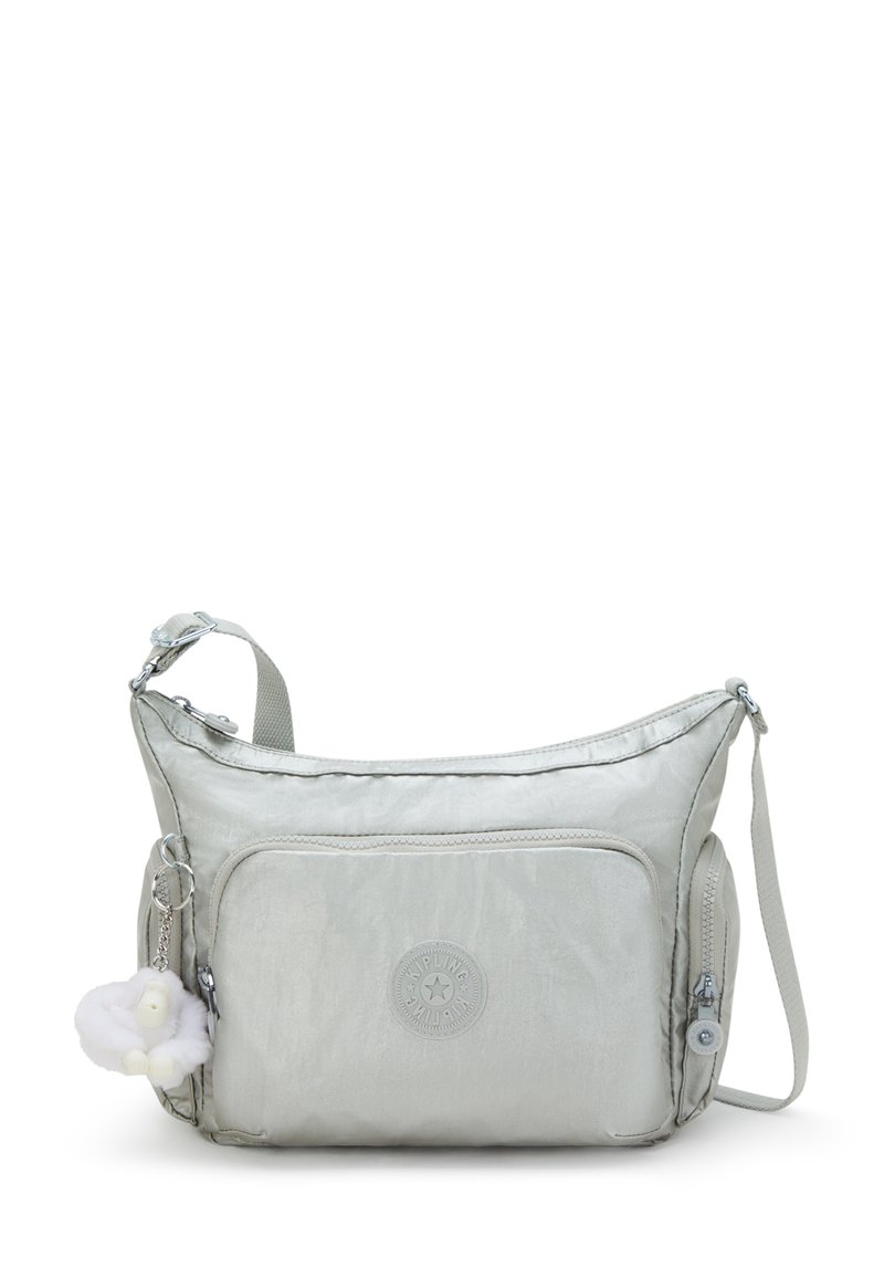 Metallic silver shoulder bag with a smooth texture, featuring a front pocket, logo patch, and a detachable charm of a white fluffy animal.