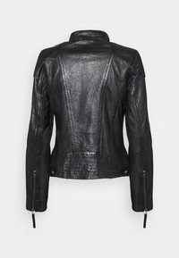 Black leather jacket with a fitted design, standing collar, and structured seams. Features zippered cuffs and subtle texture.
