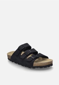 Black three-strap sandals featuring adjustable buckles, a cork footbed, and a textured rubber outsole for grip.