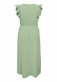 Gaiši zaļa midi kleita ar kroku īsām piedurknēm un savāktu vidukli, attēlota no muguras uz vienkārša balta fona.