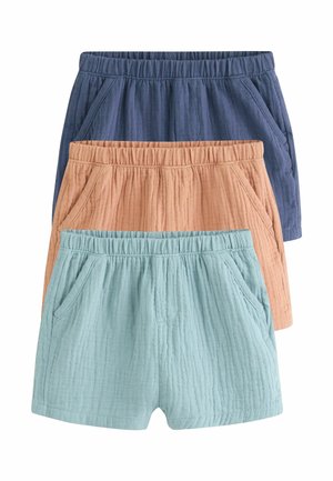 Three pairs of textured cotton shorts stacked, in blue, beige, and light blue, each with elastic waistbands and side pockets.