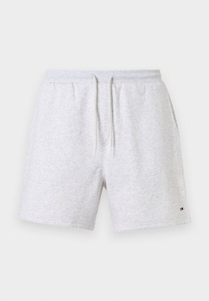 Helehallid puuvillased lühikesed püksid elastse vöö ja nööriga. Omavad küljetaskuid ja väikest logomärki alumisel äärel.