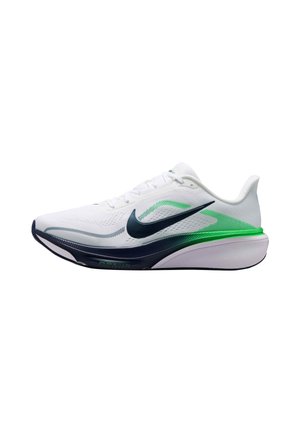 Hvid Nike løbesko med sort swoosh-logo, grønne og sorte accenter samt polstret sål, vist fra ydersiden på hvid baggrund.