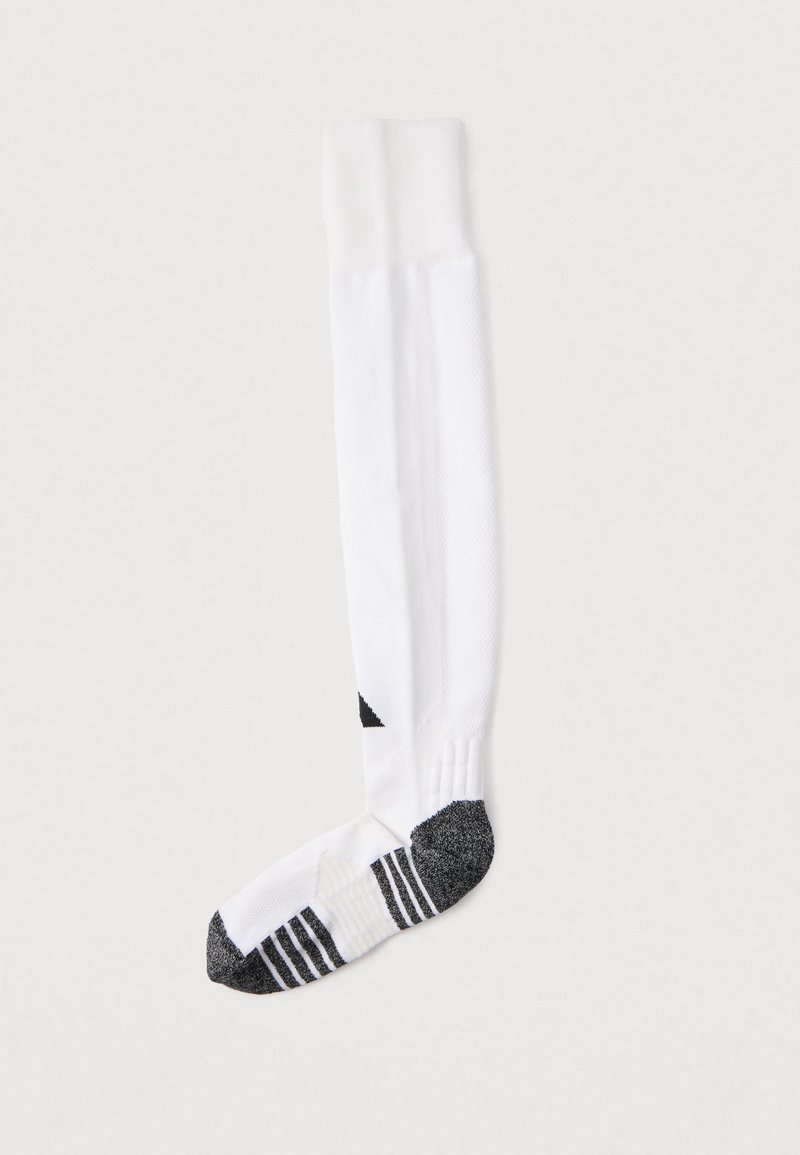 Fehér sportzokni texturált felsőrésszel, szürke sarokkal és lábujjrésszel. Fekete díszítés ferde mintával, valamint váltakozó fekete és fehér csíkokkal a boka körül.