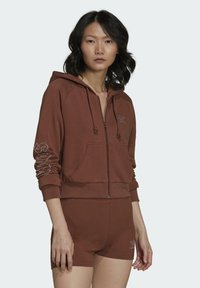 adidas Originals Športna jopa s kapuco na zadrgo - brown