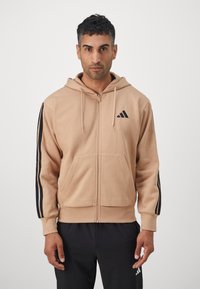 adidas Sportswear Camisola com fecho - warm sandstone/black