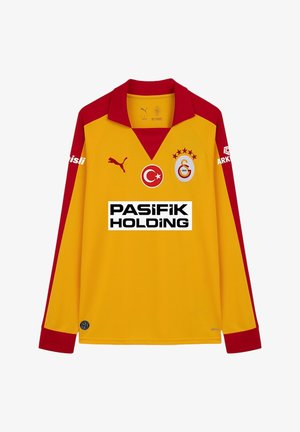 Gelbes und rotes langärmeliges Fußballtrikot mit Puma-Logo, türkischer Flagge, Galatasaray-Emblem und Pasifik Holding Sponsorenaufdruck auf der Vorderseite.