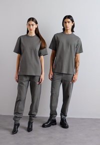 Helmut Lang OUTER UNISEX - Tracksuit bottoms - ash