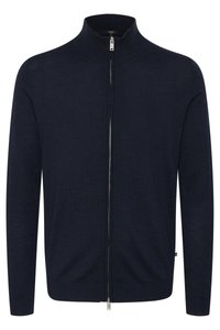 Mörkblå zip-up tröja med hög krage, tillverkad av ett slätt stickat tyg, med en silverdragkedja, långa ärmar och en slim fit.