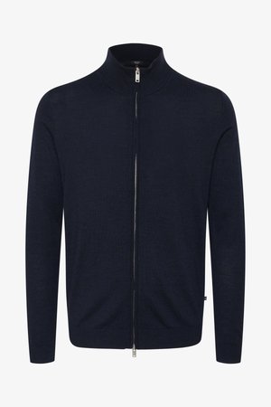 Dunkelblauer Reißverschluss-Pullover mit hochgeschlossenem Kragen, aus glattem Strickstoff gefertigt, mit silbernem Reißverschluss, langen Ärmeln und schmaler Passform.