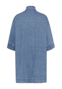 Denim shirt, light blue color, oversized design, short sleeves, collar, horizontal stitching detail on the back, smooth texture.