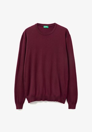 Maglione bordeaux realizzato in morbido tessuto a maglia, con scollo rotondo, maniche lunghe e polsini e orlo a coste.