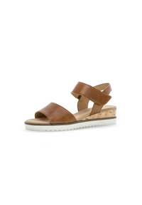 Sandalo con zeppa in pelle color sabbia, con base in sughero, dotato di due fasce larghe e una suola bianca flessibile, che mette in evidenza il design open-toe e il comfort.