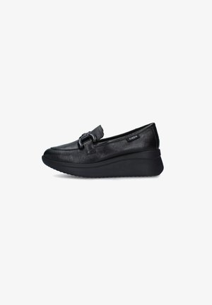 Scarpe slip-on in pelle nera con punta arrotondata, dotate di una fibbia decorativa e di una suola platform spessa per maggiore altezza e comfort.