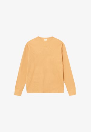 Pikkade salgaga ribboh käised pehmest kollasest puuvillast särk, ümmarguse kaelusega, väike logo detail rinna peal ja elastsed mansetid.