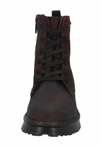 Brown leather ankle boots with black laces and a zip closure. Features a rounded toe and a thick, textured black sole.